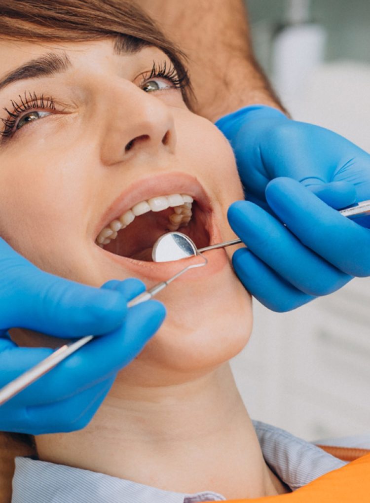 female-patient-sitting-dentist-chair-making-professinal-hygiene
